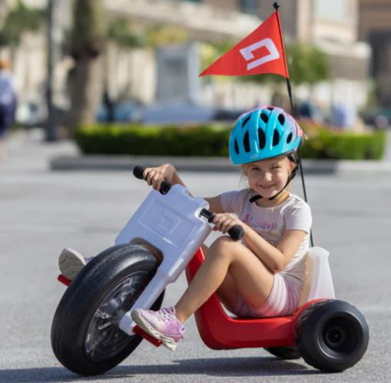 RED - DROYD Romper Electric ride-on toy for kids ages 3+,24v lithium-ion battery and a brushed DC motor, and a light-up LED front wheel